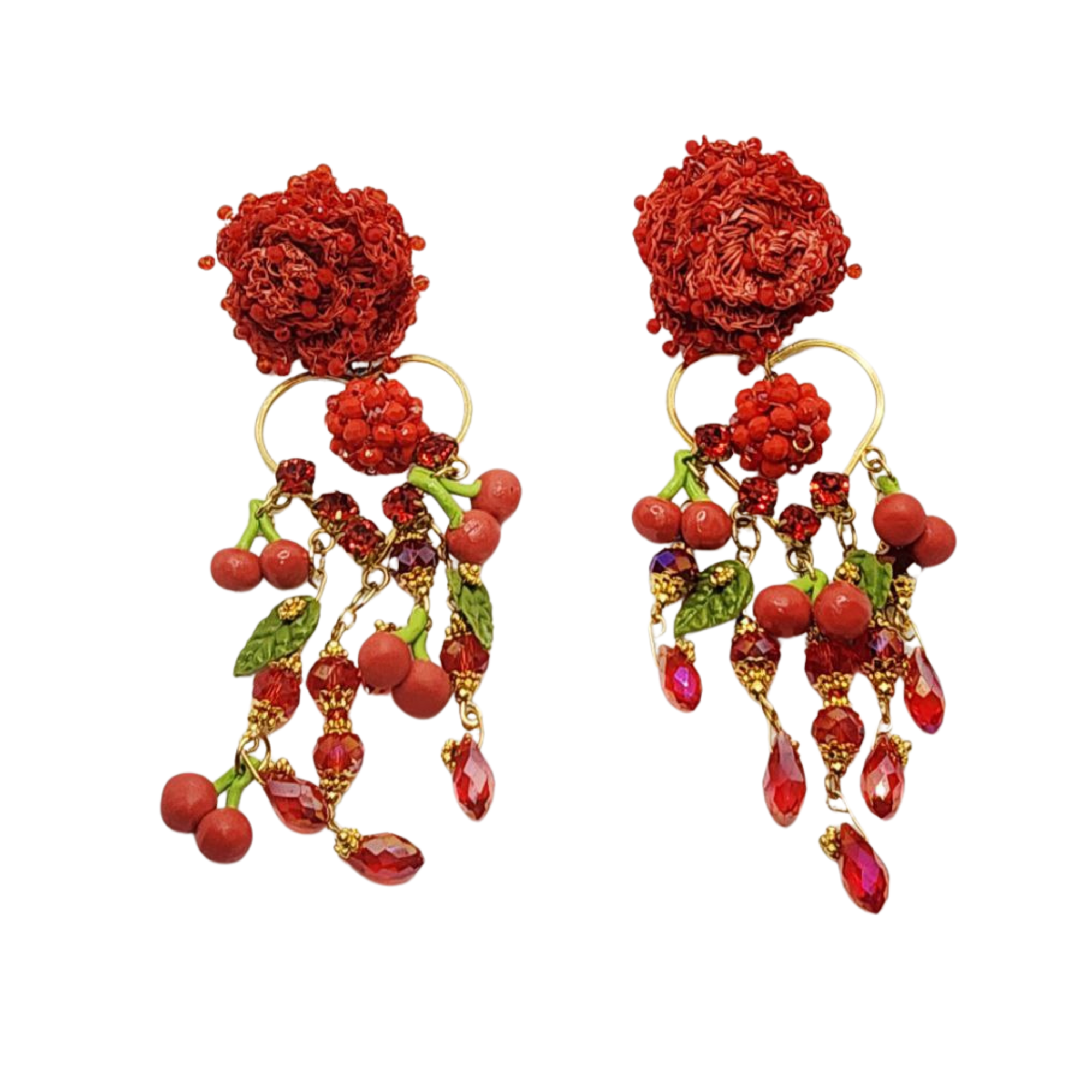 Pair of red floral earrings with dangling beads on a white background