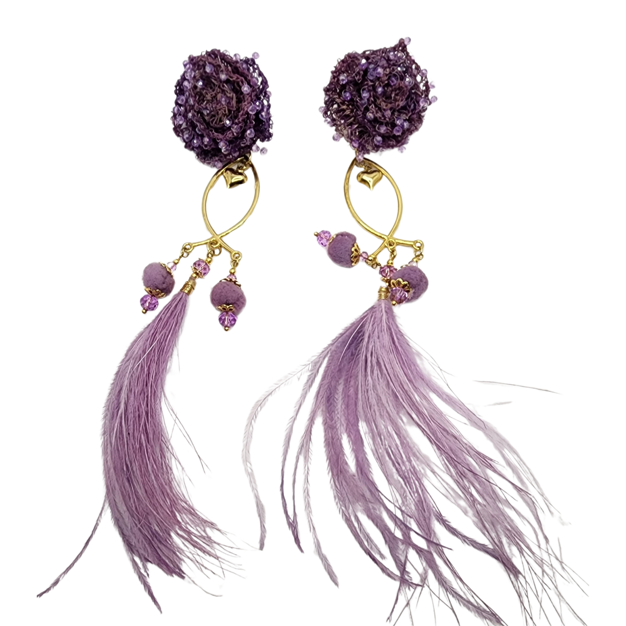 A pair of gold and purple fisherman earrings with intricate beadwork and feathered tassels.