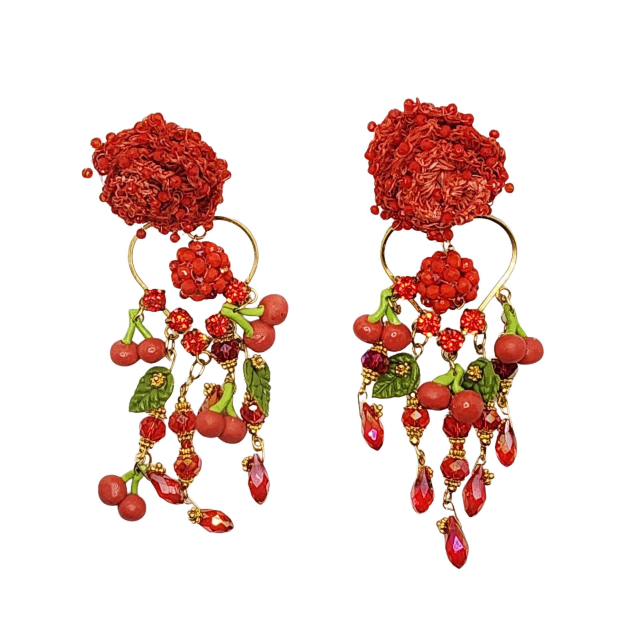 Pair of red floral earrings with gold and green accents on a white background