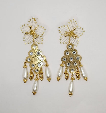 Handcrafted gold chandelier earrings with floral tops, rhinestones, and pearl-like teardrops.