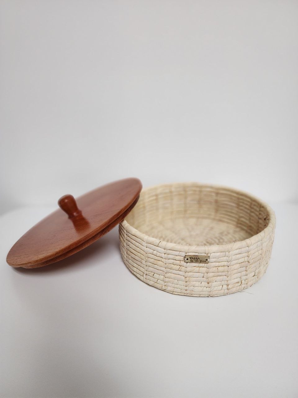 Artisanal Vegetal Fiber Basket with Wood lead