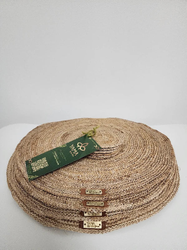 This set includes 6 handwoven banana tree fiber placemats, each paired with a matching glass coaster. Made by skilled artisans, the placemats showcase the natural beauty of banana tree fibers, offering both durability and eco-friendly elegance. Perfect for any dining occasion, this set adds a rustic, sustainable touch to your table setting.