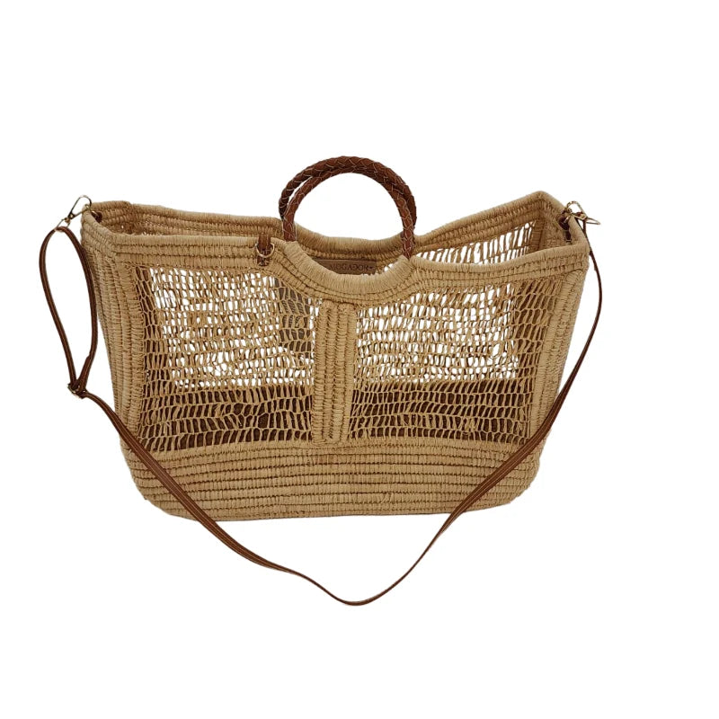 Handcrafted Enea Leather Beach Bag with open-weave design, leather handles, and shoulder strap on white background