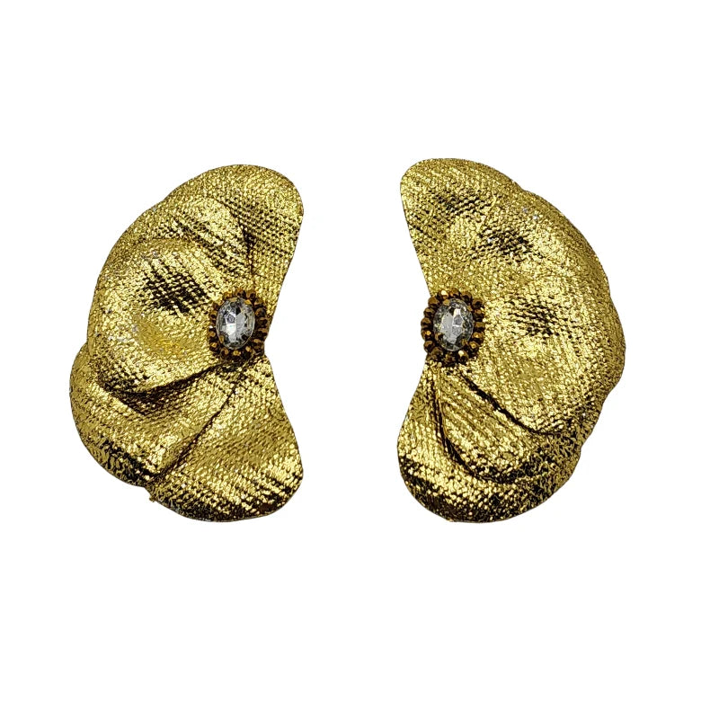 These exquisite handcrafted earrings, made from banana fiber, feature a stunning layered petal design with a radiant gold, silver or rose gold texture. A luminous triangular crystal at the center enhances their elegance, blending natural beauty with sophistication.