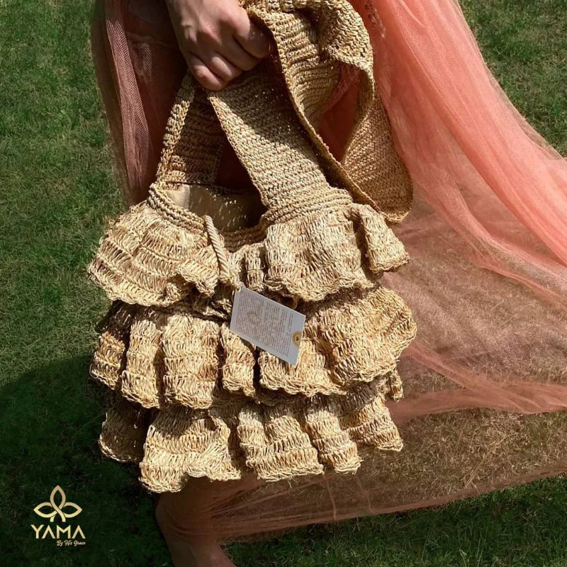 The Bolero Bag is a medium-sized handcrafted accessory designed for everyday elegance. Made from sustainable banana tree fibers, it highlights the beauty of raw materials with a naturally textured finish and thoughtful artisanal details.