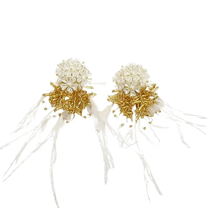 Perfect for the contemporary bride, these handcrafted earrings feature exquisite detail that enhances your wedding look with timeless luxury and sophistication