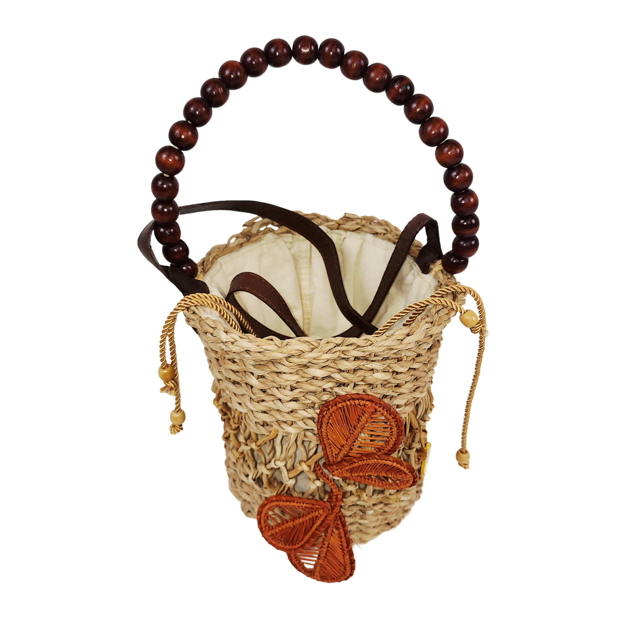 Bucket Flower Bag with orange woven flower accent, wooden beaded handle, and drawstring closure on white background