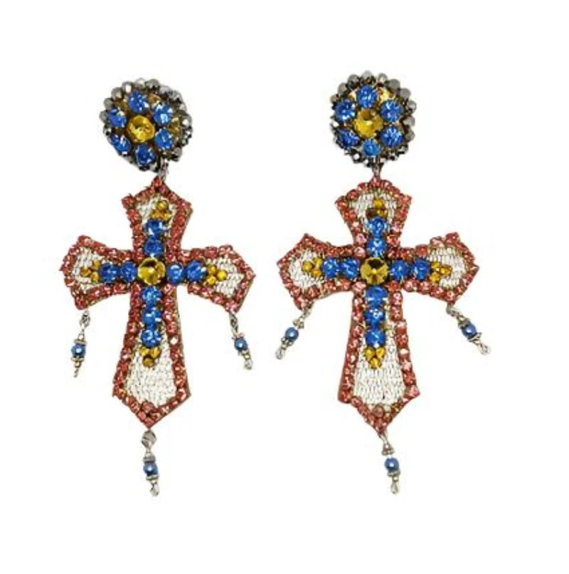 Experience divine elegance with our Handcrafted Cross Earrings, featuring vibrant Murano stones and luxurious fine jewelry accents. 