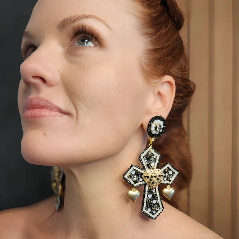 Experience divine elegance with our Handcrafted Cross Earrings, featuring vibrant Murano stones and luxurious fine jewelry accents. 