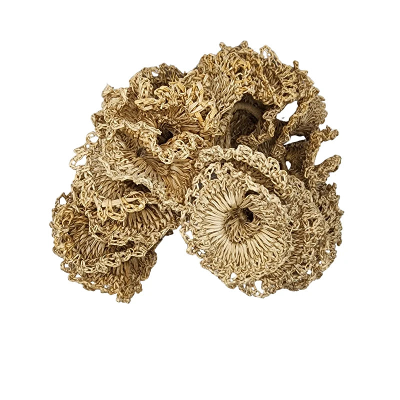 Hand-embroidered by skilled Colombian artisans, these earrings are crafted from 100% natural banana fiber in a captivating circular design.