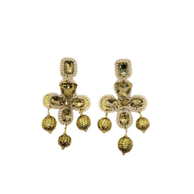 These handcrafted earrings blend artisanal mastery with timeless charm, featuring intricate beadwork and golden accents. The dangling golden orbs add a dynamic touch, exuding opulence and purity.