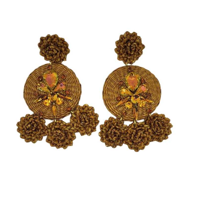 hese earrings showcase a golden color that beautifully complements the intricate floral embellishments, making them the perfect accessory for adding a touch of elegance to any outfit.