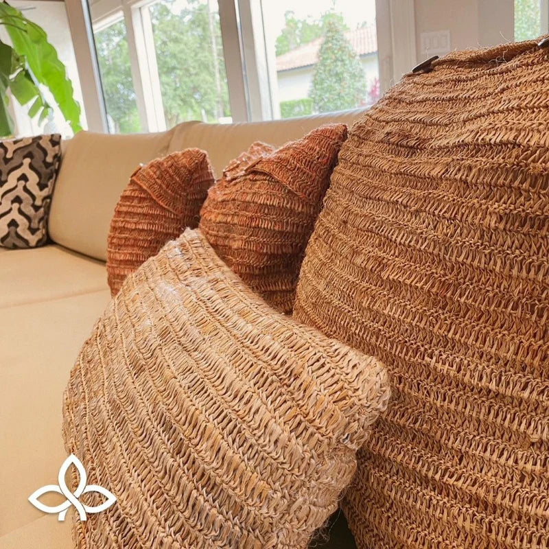 Add natural charm to your living space with these handwoven fiber cushions. Crafted by skilled artisans, these cushions feature a textured, organic design that complements any decor style, from rustic to modern. Perfect for enhancing comfort and adding a unique artisanal touch to your sofa or lounge area.
