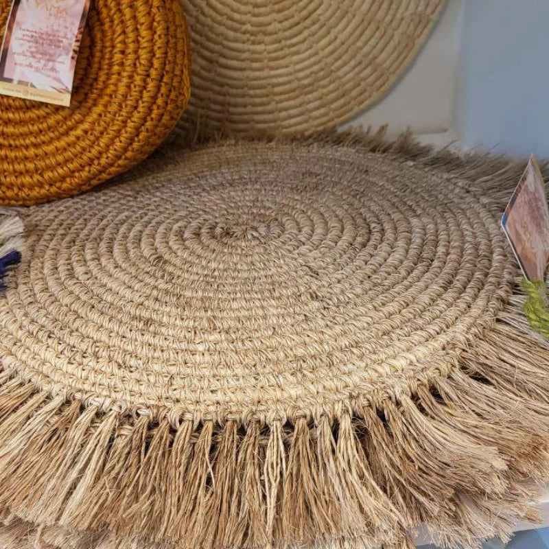 Enhance your table setting with this beautifully handwoven placemat and coaster set, crafted from sustainable Fique raw material. The set offers durability and natural charm, making it an ideal choice for both everyday meals and special occasions.