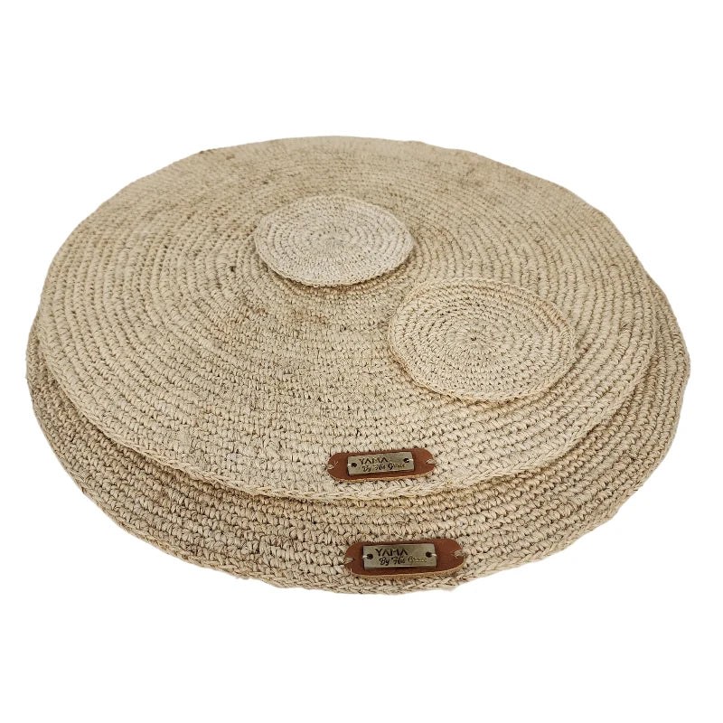 Enhance your table setting with this beautifully handwoven placemat and coaster set, crafted from sustainable Fique raw material. The set offers durability and natural charm, making it an ideal choice for both everyday meals and special occasions.
