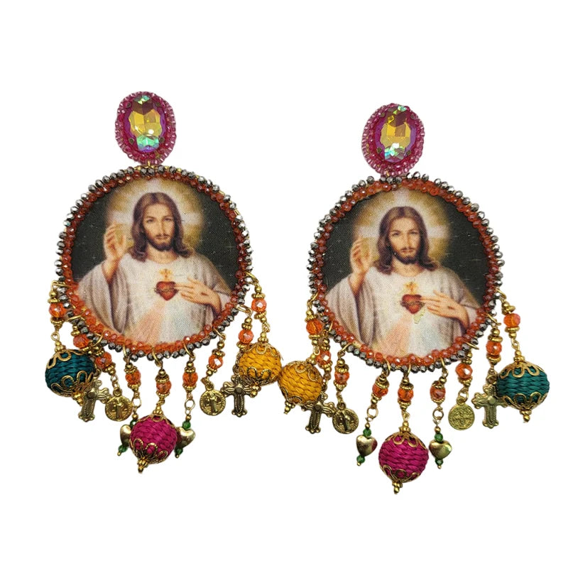 Embrace your faith with the I AM Earrings, crafted from sustainable banana tree fibers. Featuring an image of Jesus, these lightweight earrings symbolize His eternal presence and divine power.