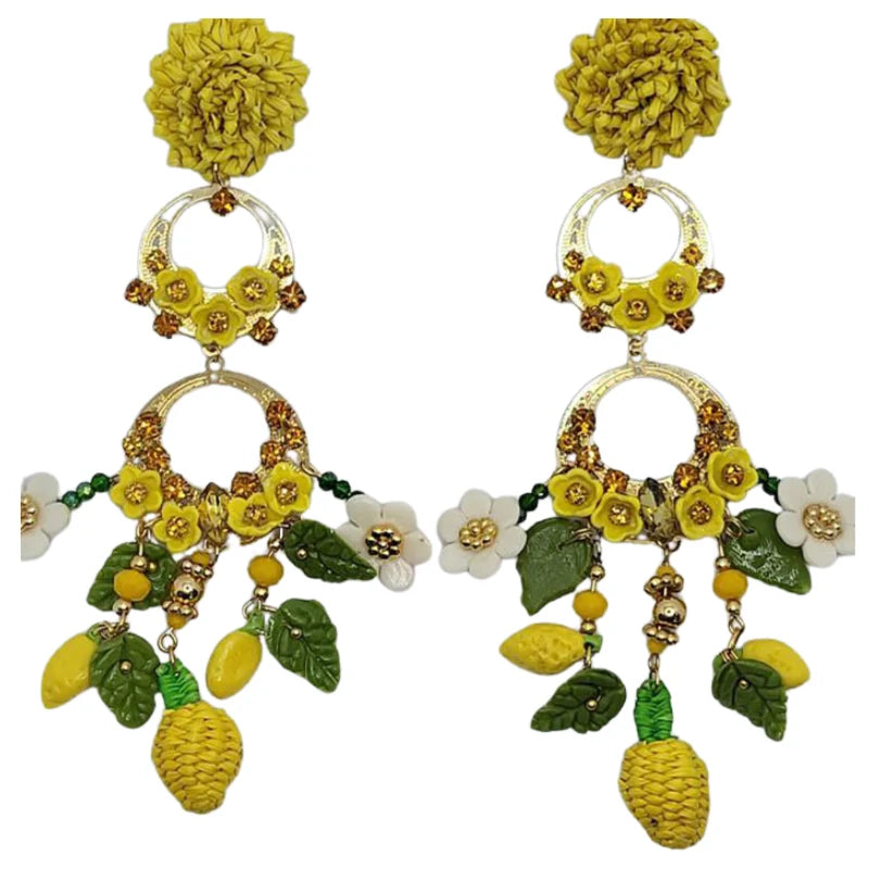 This handmade design features a large flower on top of a round element, decorated with artistic flowers crafted from natural materials. At the center, it showcases the most shining and wonderful food on Earth—the fruit—highlighted by a Murano stone accent over a heart-shaped base