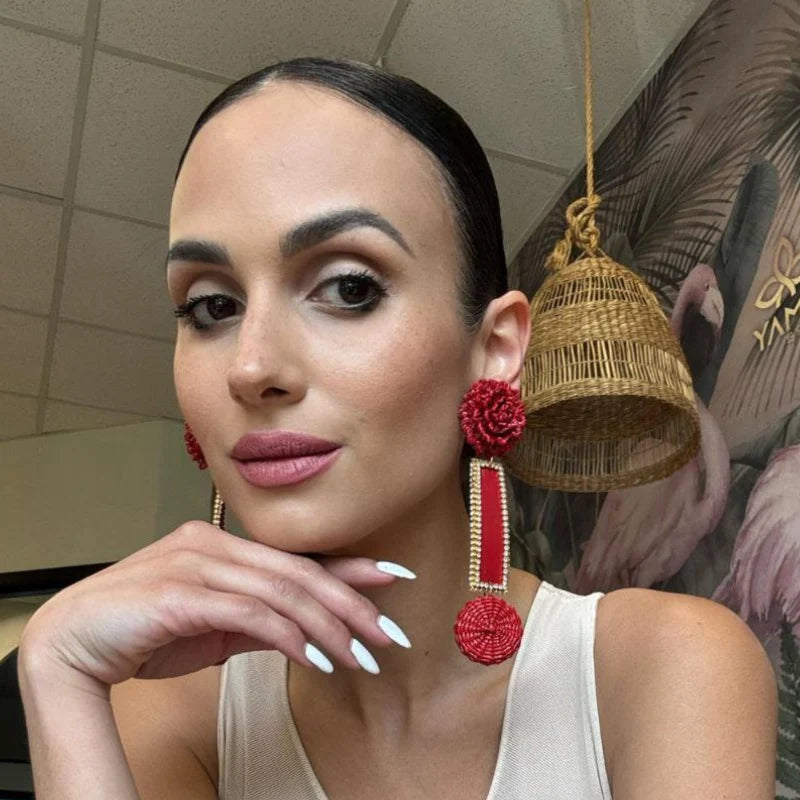 woman wearing earrings for a red carpet event