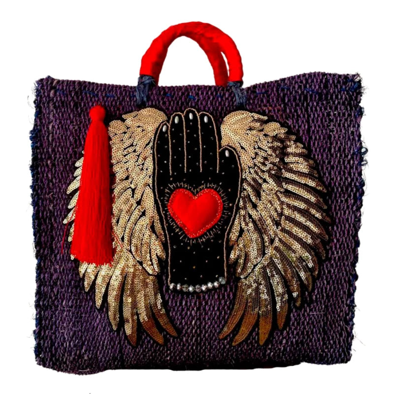 Discover the charm of Mexican Handcrafted Bags, designed by skilled artisans to celebrate Mexico’s rich cultural heritage. These bags feature intricate embroidery with hearts, angel wings, and meaningful quotes, brought to life with vibrant colors and detailed patterns. Spacious interiors and durable craftsmanship make them perfect for daily use or special occasions.
