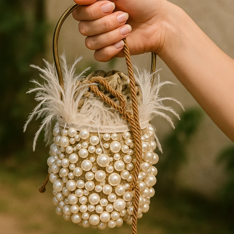 The Minaudière White Pearls Bag is a timeless handcrafted piece designed to elevate your look with elegance and purpose.