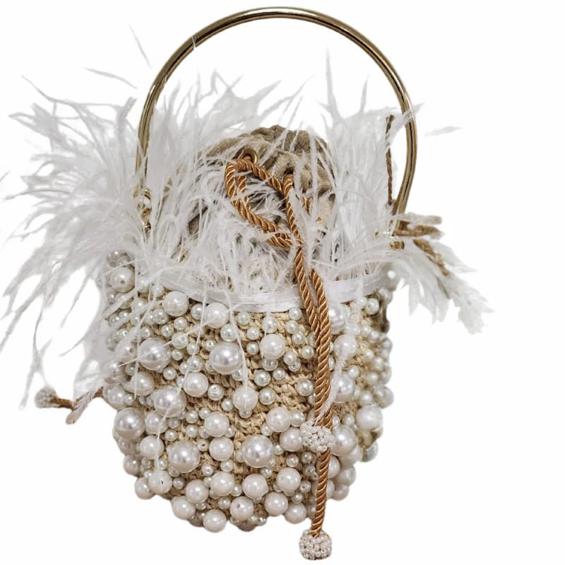 The Minaudière White Pearls Bag is a timeless handcrafted piece designed to elevate your look with elegance and purpose.