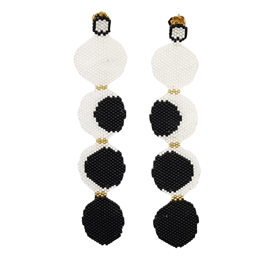 Miyuki Circle Fall Earrings with round white and black beaded shapes connected in a flowing vertical pattern with gold accents
