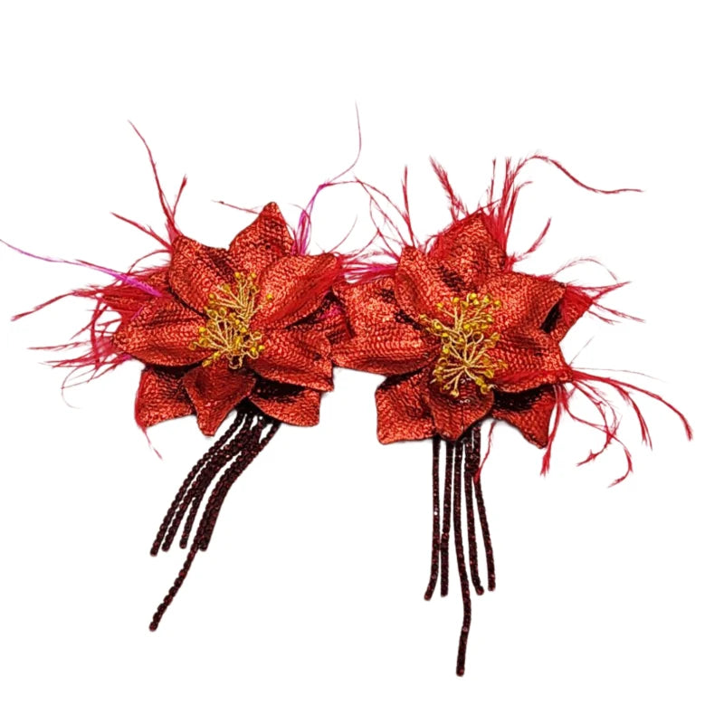Handcrafted with vibrant scarlet petals, playful feather accents, intricate yellow beadwork, and cascading red crystal fringe, these earrings bring movement, texture, and drama to any outfit.