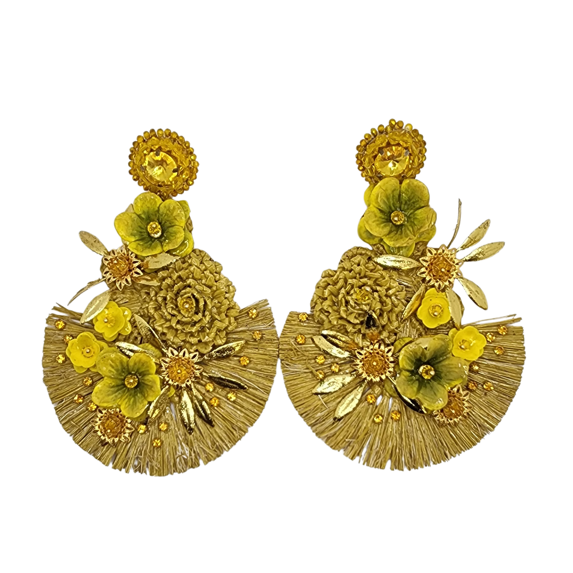 Pair of handcrafted floral earrings in golden tones with textured raffia fans, detailed petals, and metallic leaves.