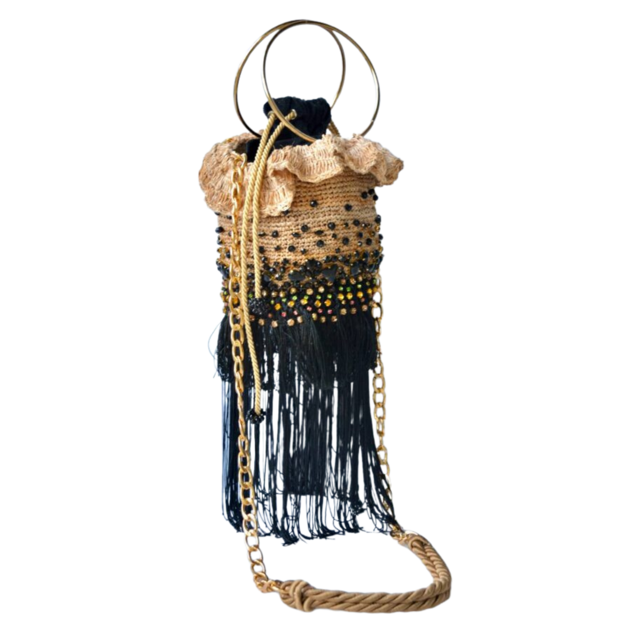 Natural fiber bucket bag with black and gold beadwork, gold chain strap, and long black fringe trim.