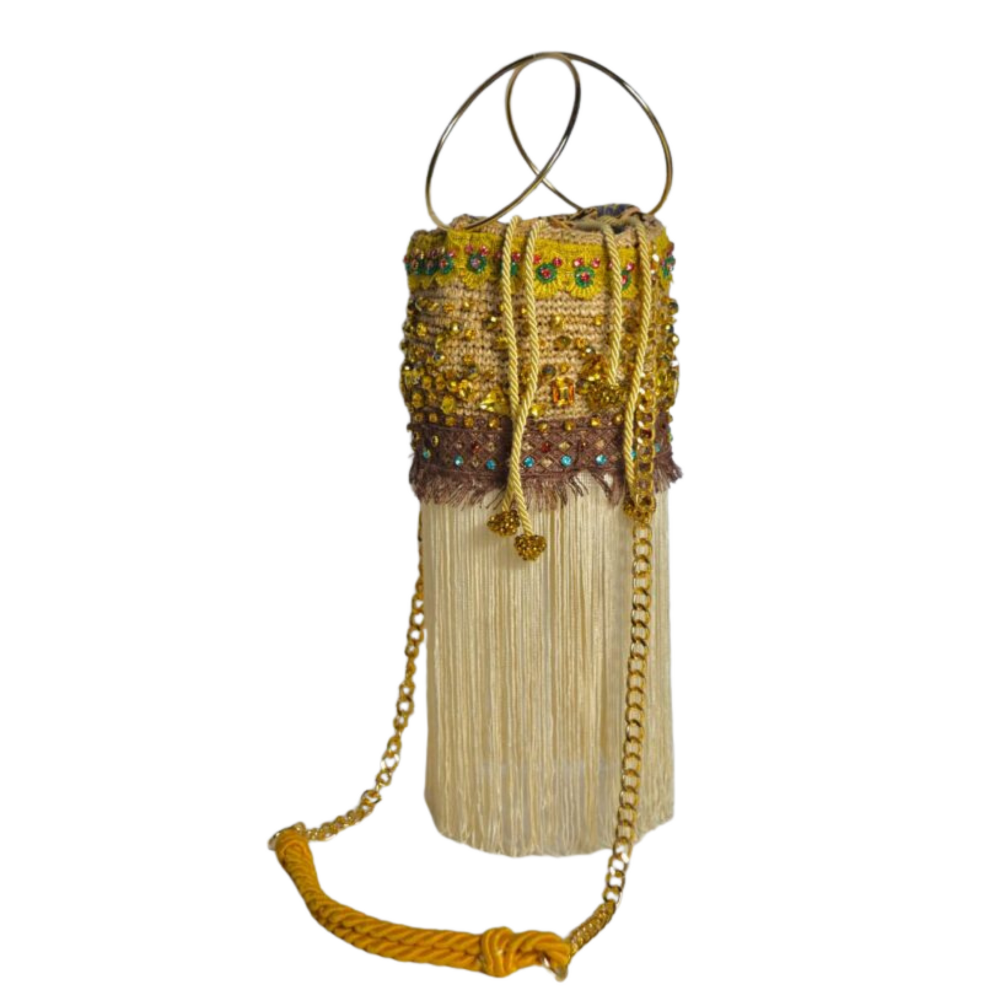 Natural fiber bucket bag with green and brown beadwork, gold chain strap, and long ivory fringe trim
