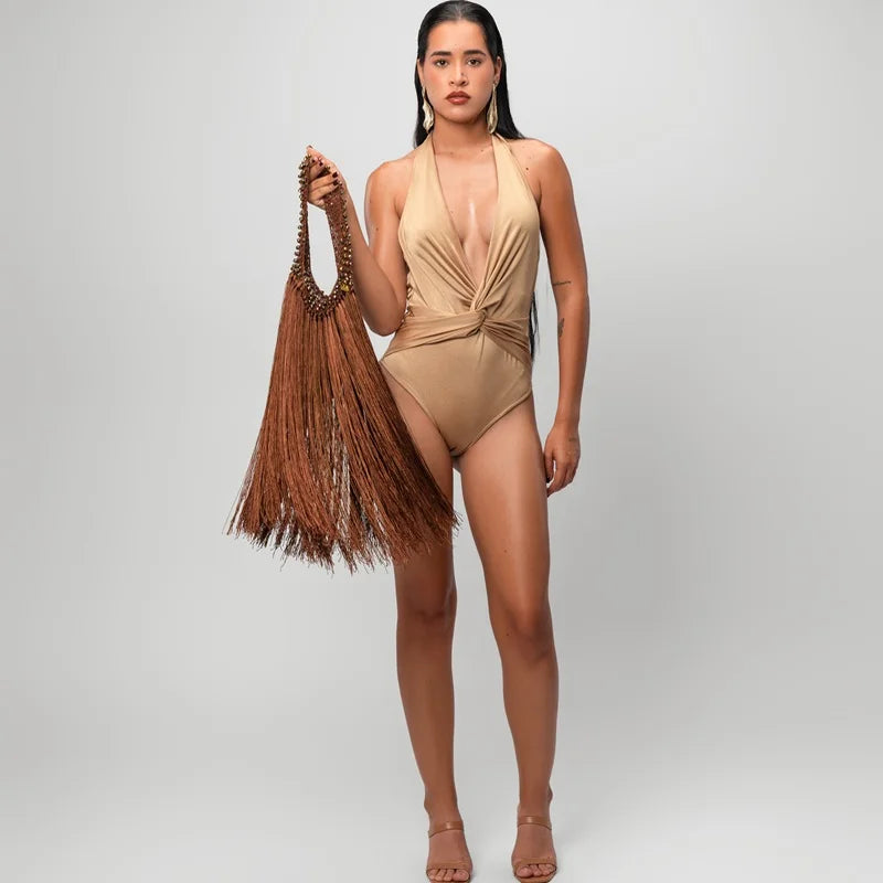 The Cascade Fringe Bag is a luxury handmade statement handbag designed for women who love timeless style, artisan craftsmanship, and one-of-a-kind fashion. Expertly handcrafted with elegant cascading fringe, this bag adds movement, texture, and sophistication to every outfit.
