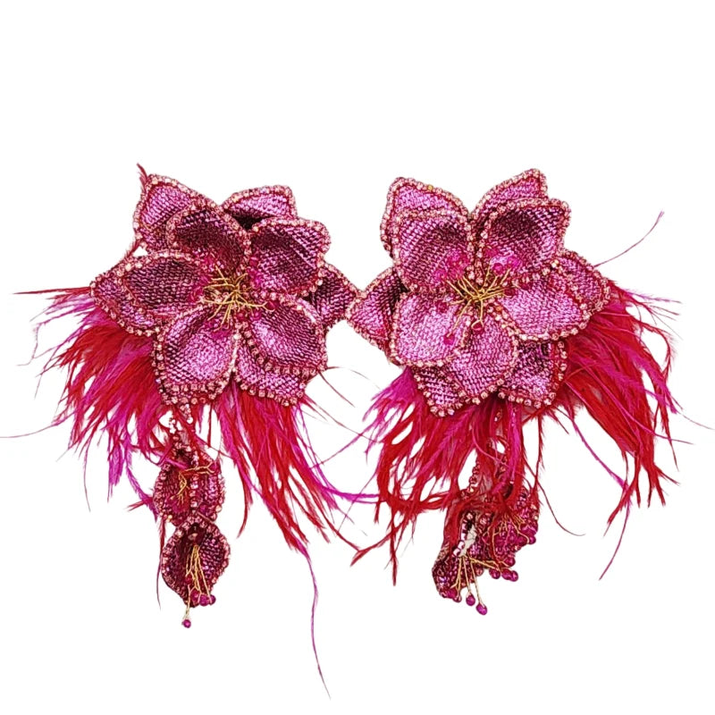 he Petal Fuchsia Earrings combine vibrant color with artisanal craftsmanship to create a bold floral statement.