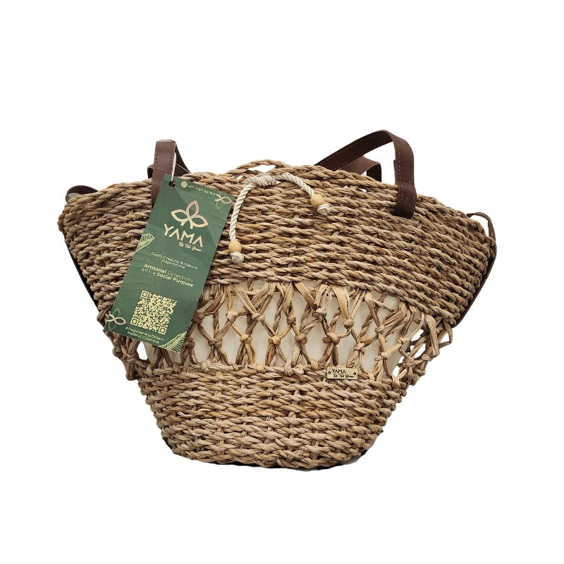 Medium Woven Campana Bag with brown leather handles and woven banana fiber body, product tag visible.