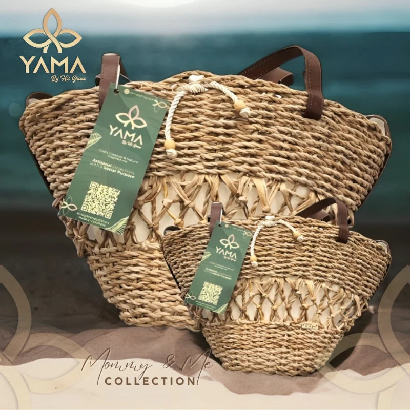 Product shot of both sizes of Woven Campana Bag labeled “Mommy & Me Collection” on sand