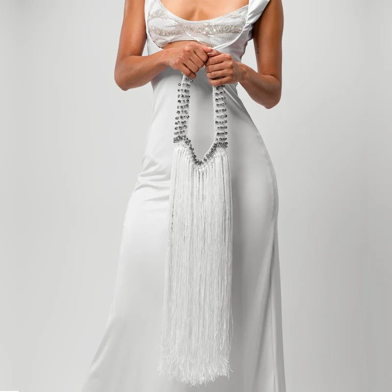 perfect as a beach bag, resort bag, vacation handbag, everyday luxury tote, or statement accessory for brunch, weddings, festivals, and special occasions. Lightweight, stylish, and versatile, it's designed to transition effortlessly from day to night.