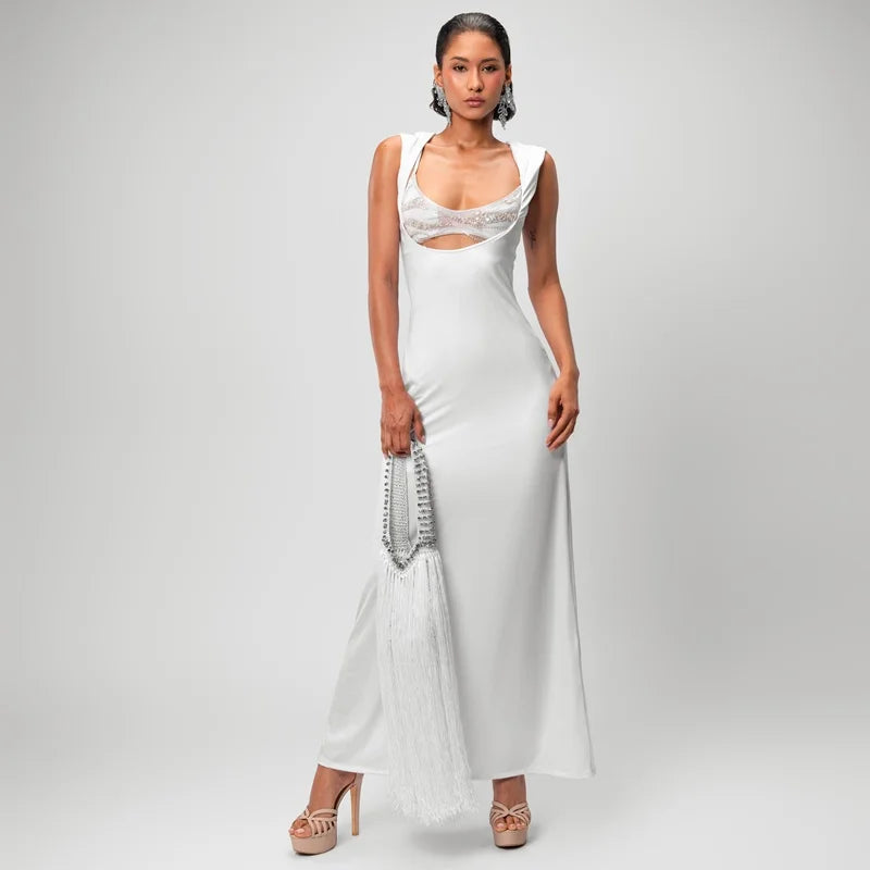 The Cascade Fringe Bag is a luxury handmade 