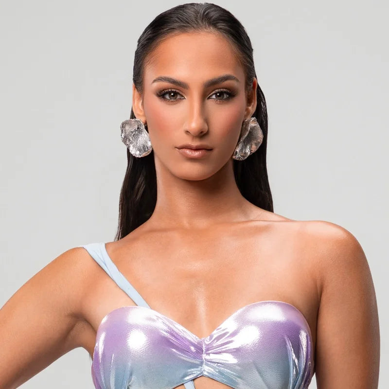 Make a bold fashion statement with these stunning sculptural earrings